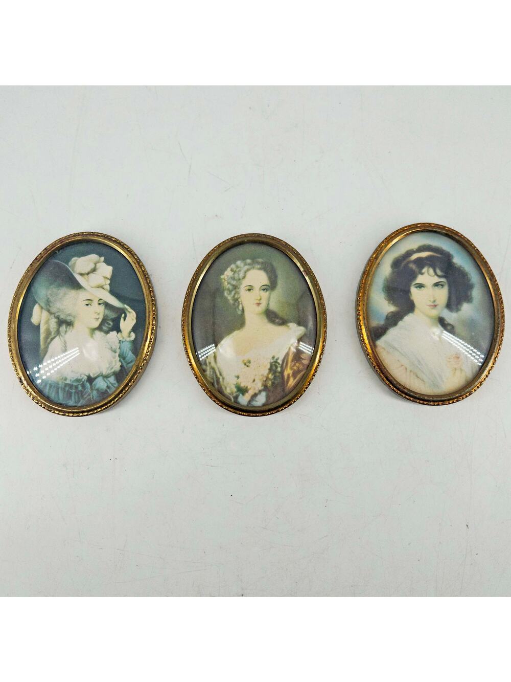 Set of 3 Vintage miniature portrait of ladies in Brass Frame w Convex Glass
